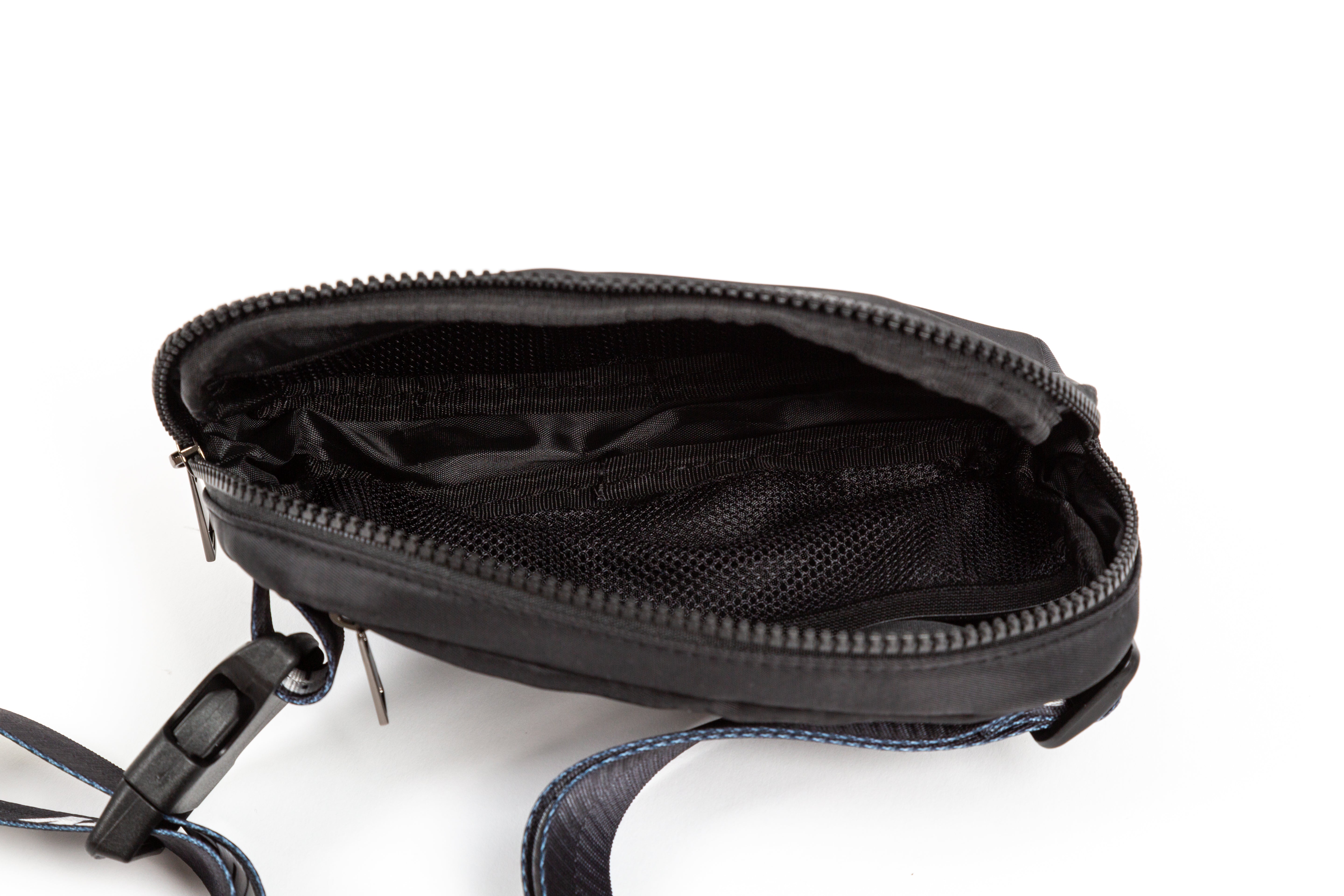 black for KING + COUNTRY fanny pack front view strap bag embroidered symbols nylon belt inside pocket view